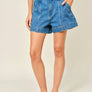 Mid Rise Flare Denim Shorts by Aaron & Amber