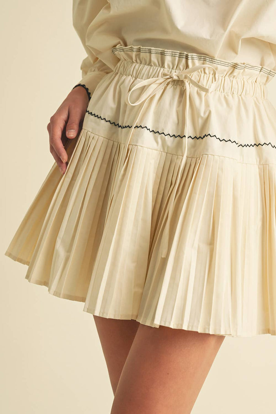 Pleated Embraided Cotton Mini Skirt