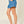 Mid Rise Flare Denim Shorts by Aaron & Amber